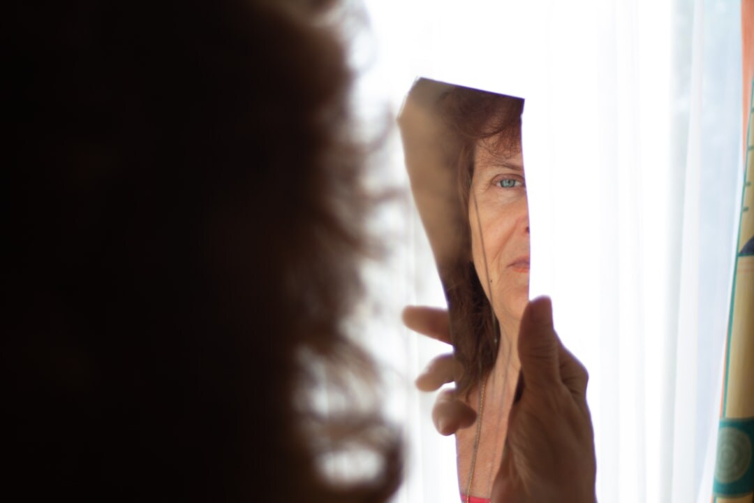 person practicing speech in mirror